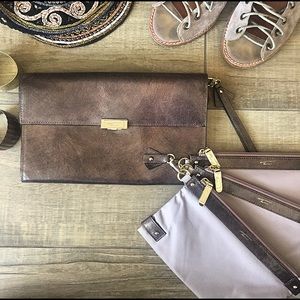 TUMI LEATHER CLUTCH